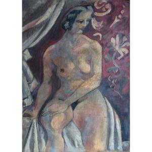 Femme nue dans un atelier début XXème