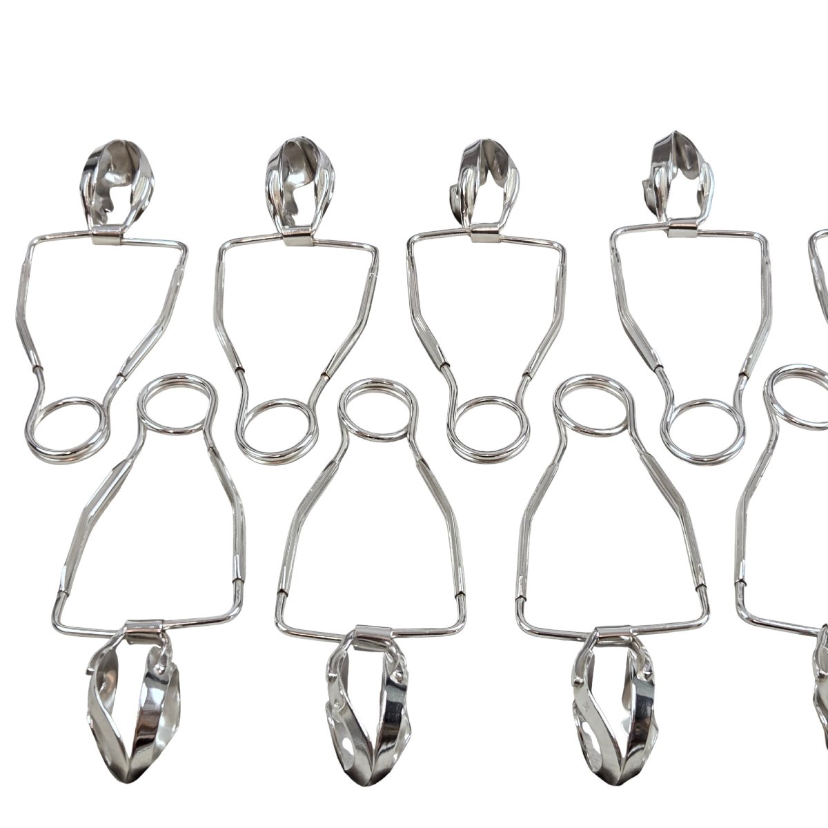 Ensemble de 12 pinces à escargot en métal argenté, orfèvre Ercuis.-photo-3
