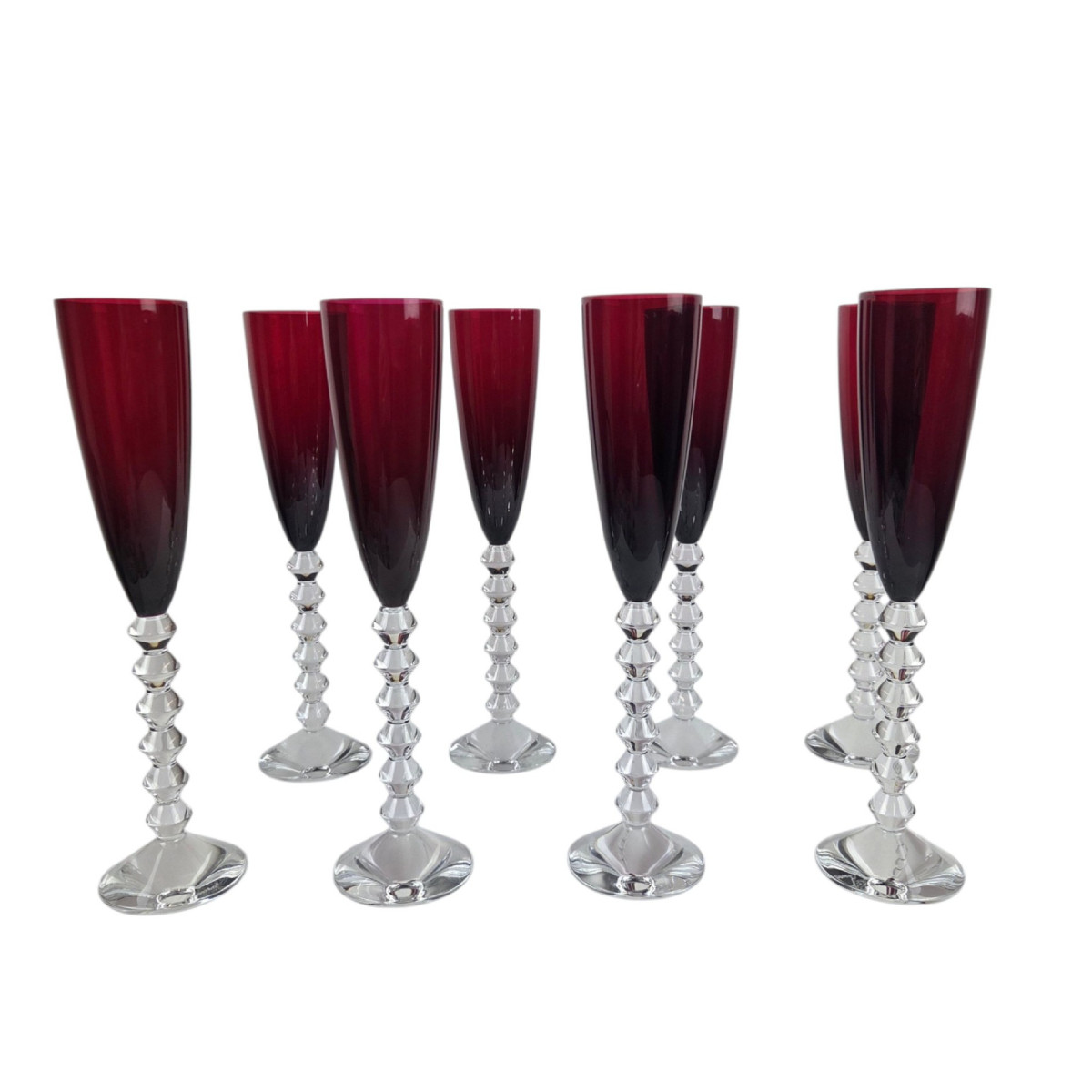 Suite de 8 flûtes en cristal de Baccarat Rubis, modèle Flutissimo Véga.