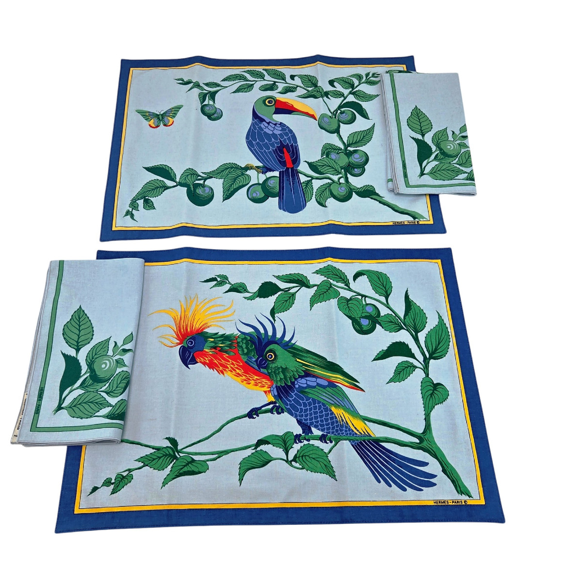 Paire de sets de table et serviettes de table en coton , modèle Toucan, maison Hermès Paris.