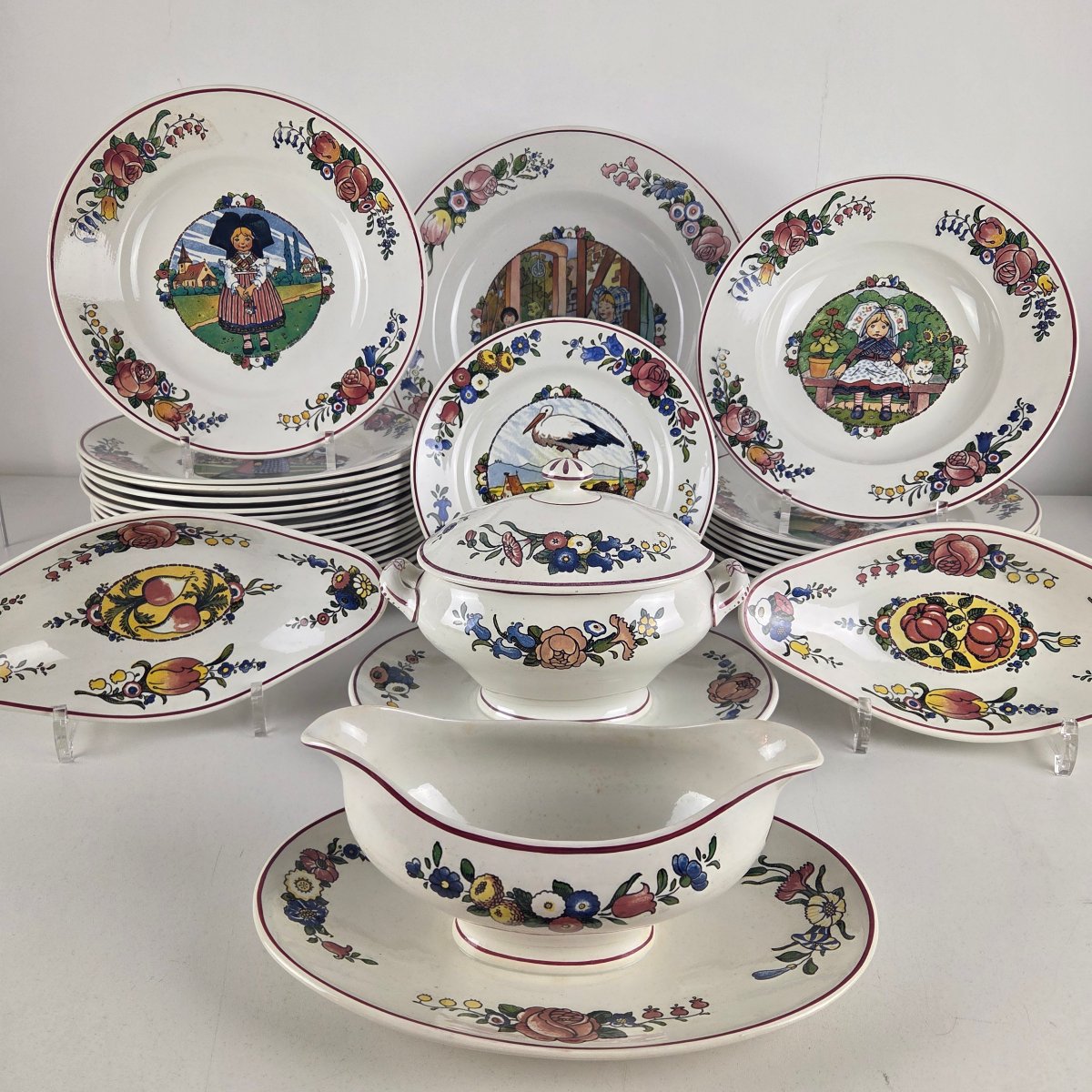 A 30-piece Tableware Set Made Of Sarreguemines Earthenware, “annales” Model.