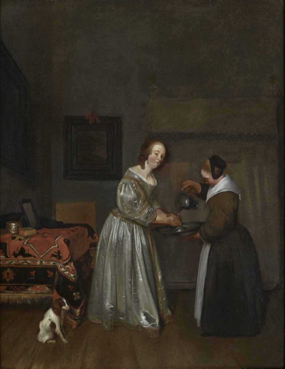Intérieur avec une dame en gris se lavant la main – Gerard ter Borch (1617 - 1681)