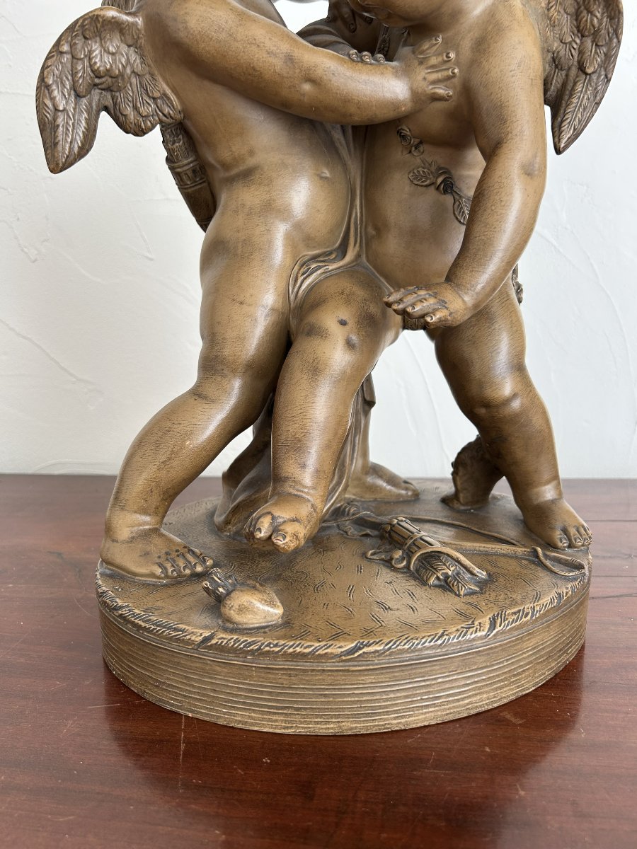 Terre cuite " deux amours se disputant un cœur "-photo-1