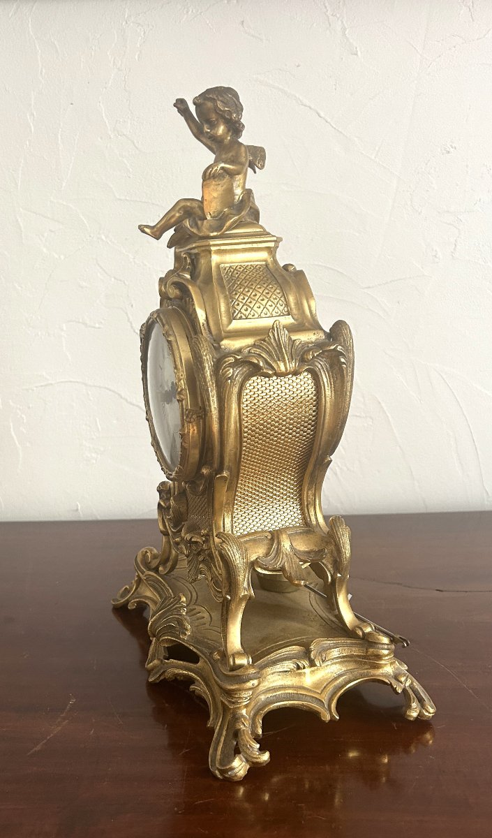 Pendule en bronze doré style Louis XV rocaille-photo-1