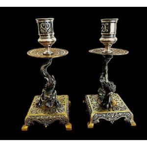 Paire de bougeoirs style Renaissance en bronze argenté et bronze doré