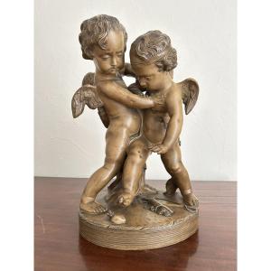 Terre cuite " deux amours se disputant un cœur "