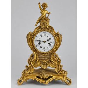 Pendule en bronze doré style Louis XV rocaille