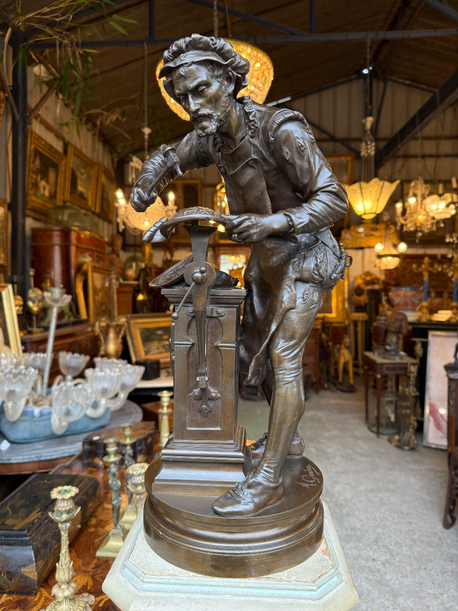 Personnage XIXème en bronze à patine brune "le dinandier" signé A. GAUDEZ (1845 - 1902) Susses 