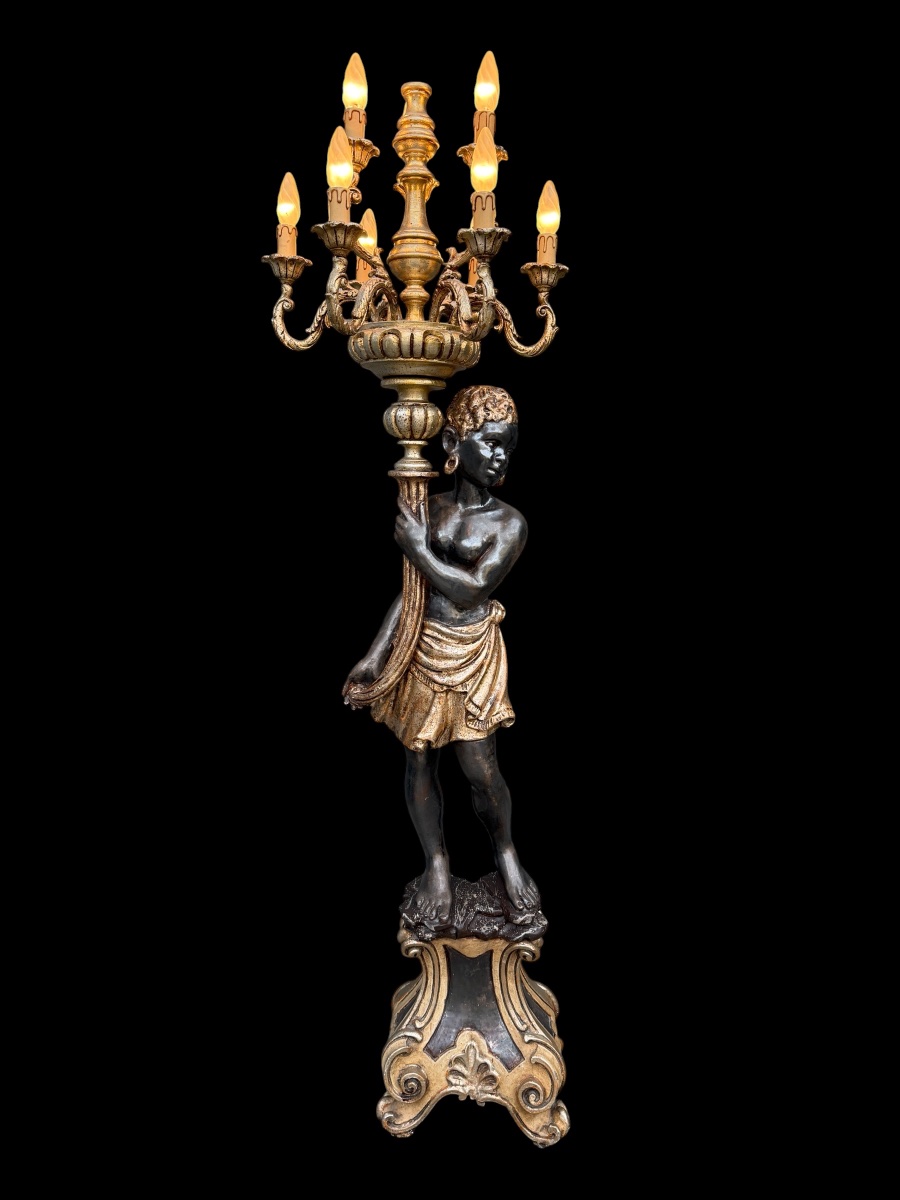 Torchère Nubien en bois sculpté et argenté a 9 lumières , XXème siècle 