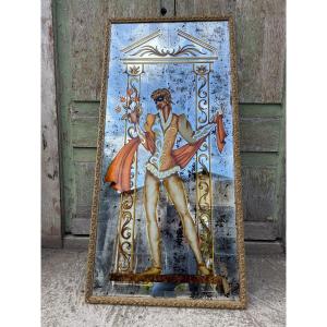 Miroir églomisé rectangulaire, décor d’un personnage de la comedia dell’arte XXème siècle 