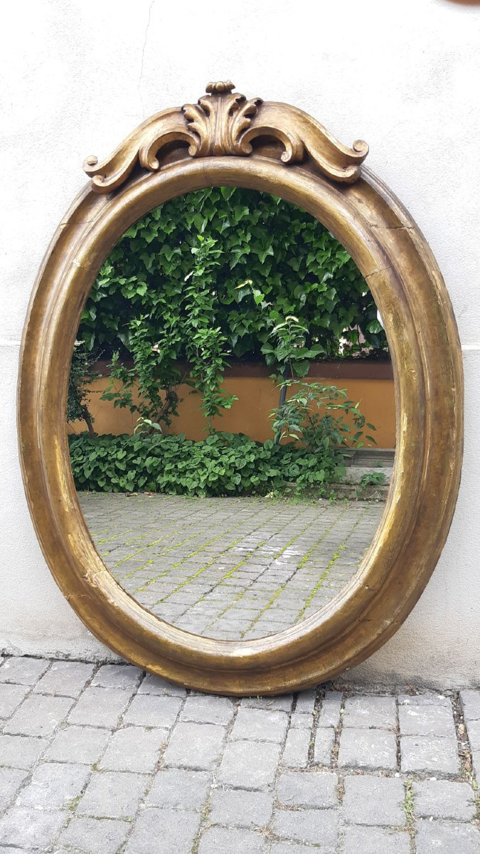 Antique Neapolitan Oval Mirror From The 18th Century With Cornice