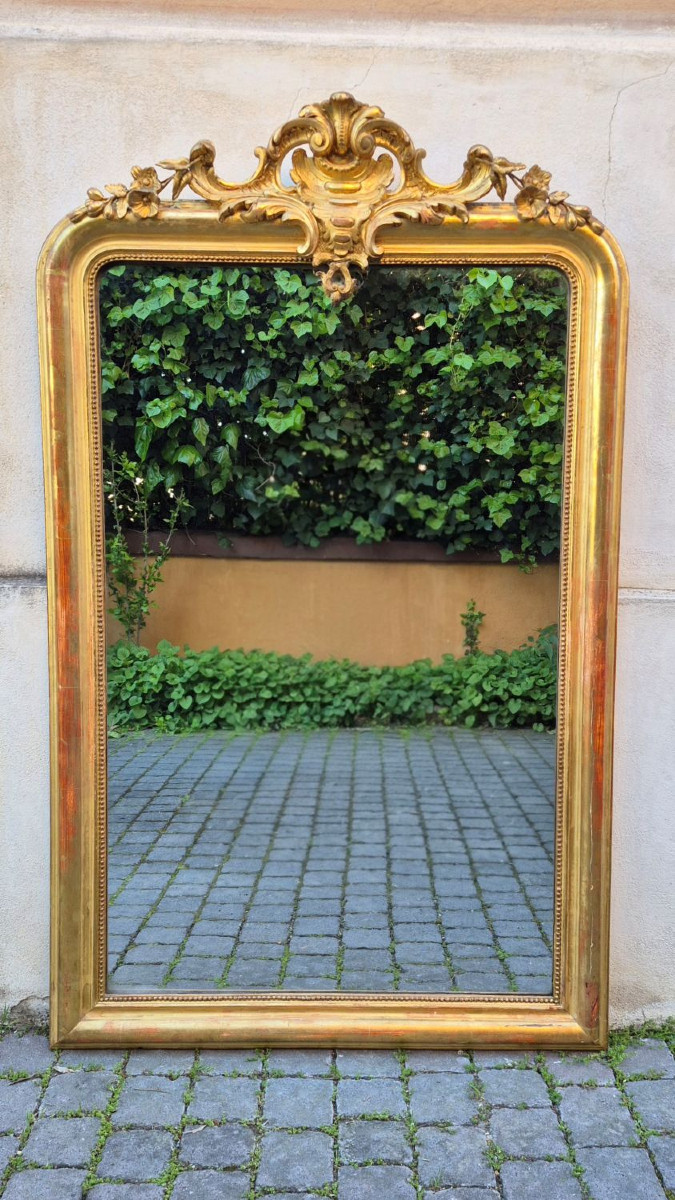 Miroir ancien en bois doré avec motif de scorpion au dos