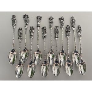 12 Small Silver Spoons Lol