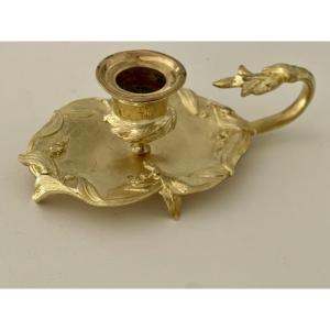 Bougeoir à main 1900 Art Nouveau en bronze doré décor eucalyptus