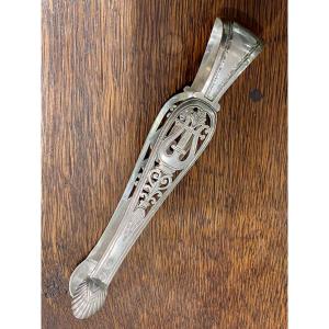Pince à sucre argent vieillard décor de lyre début XIX