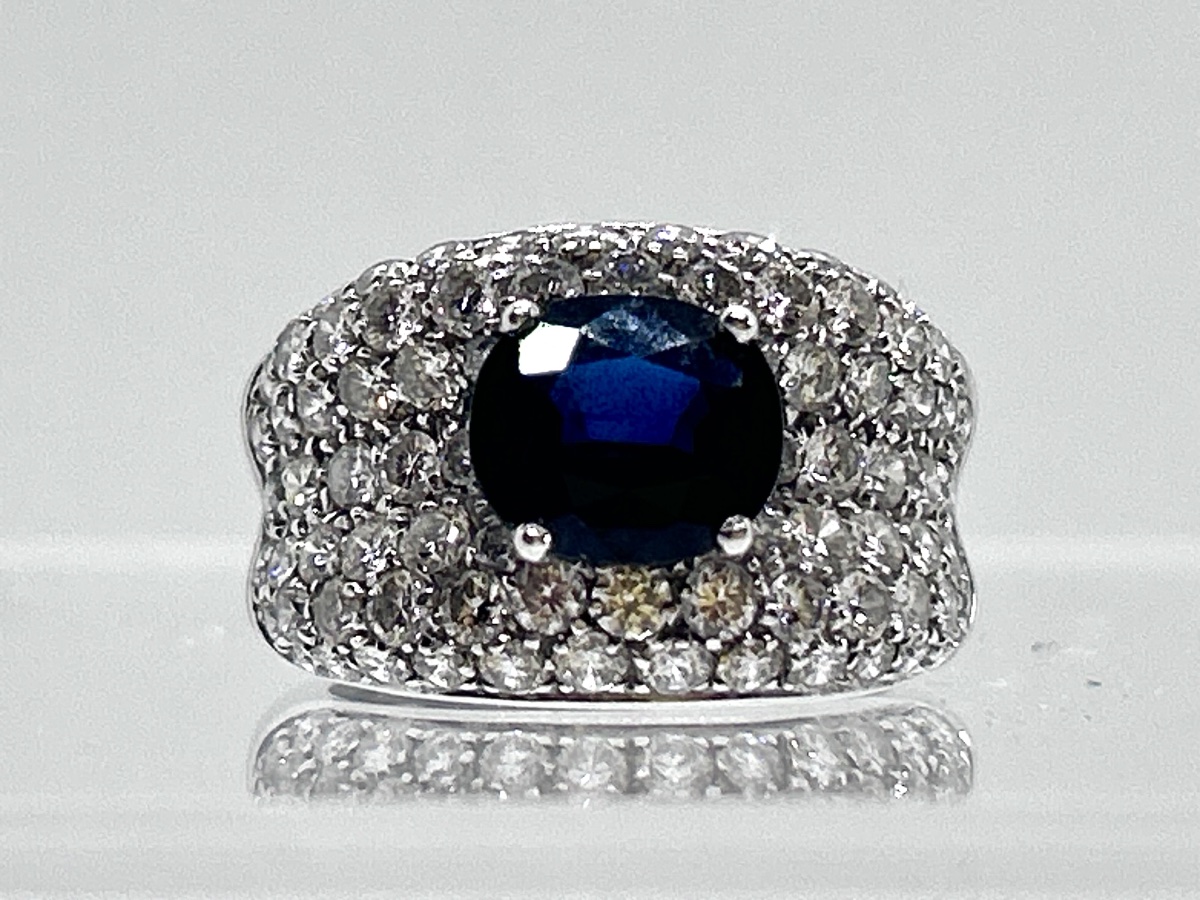 Cocktail Ring In 18-carat White Gold Paved With Brilliants And Set With A Blue Sapphire