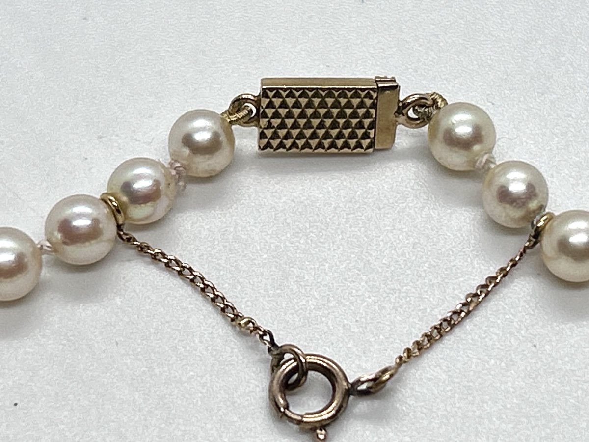 Cascading Cultured Pearl Necklace With An 18-karat Gold Clasp-photo-4