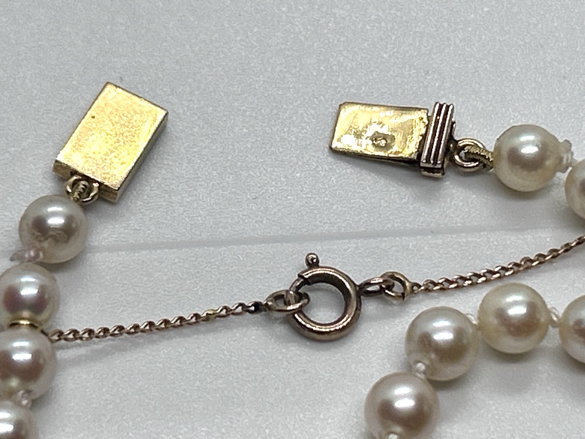 Cascading Cultured Pearl Necklace With An 18-karat Gold Clasp-photo-5