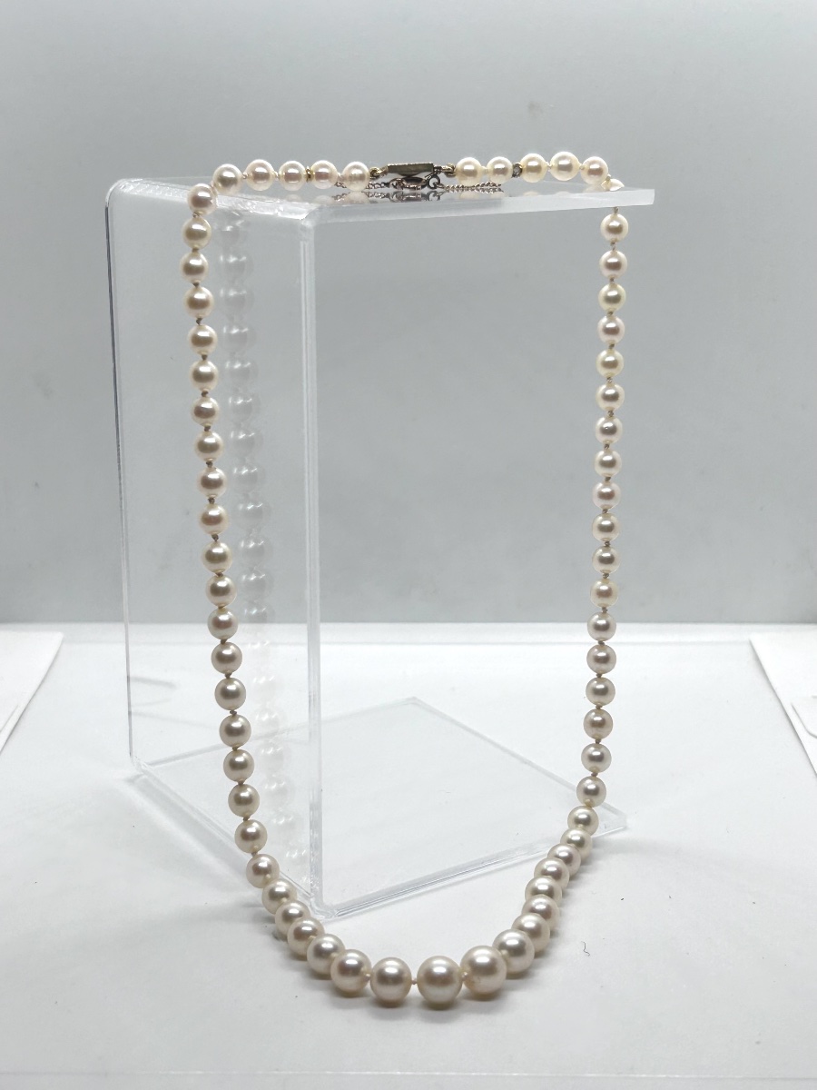Cascading Cultured Pearl Necklace With An 18-karat Gold Clasp