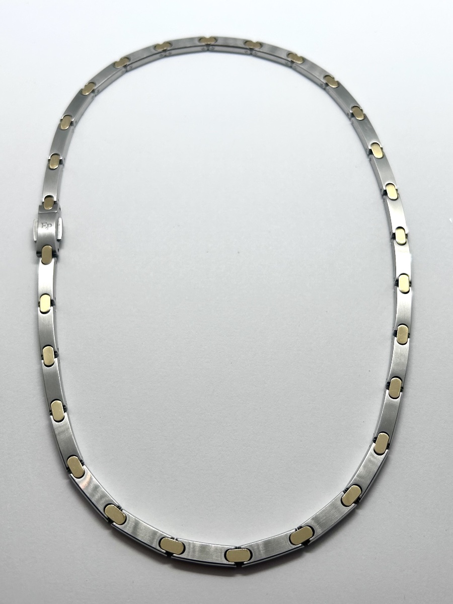 Collier en or 18 carats et acier maison Pequinet 