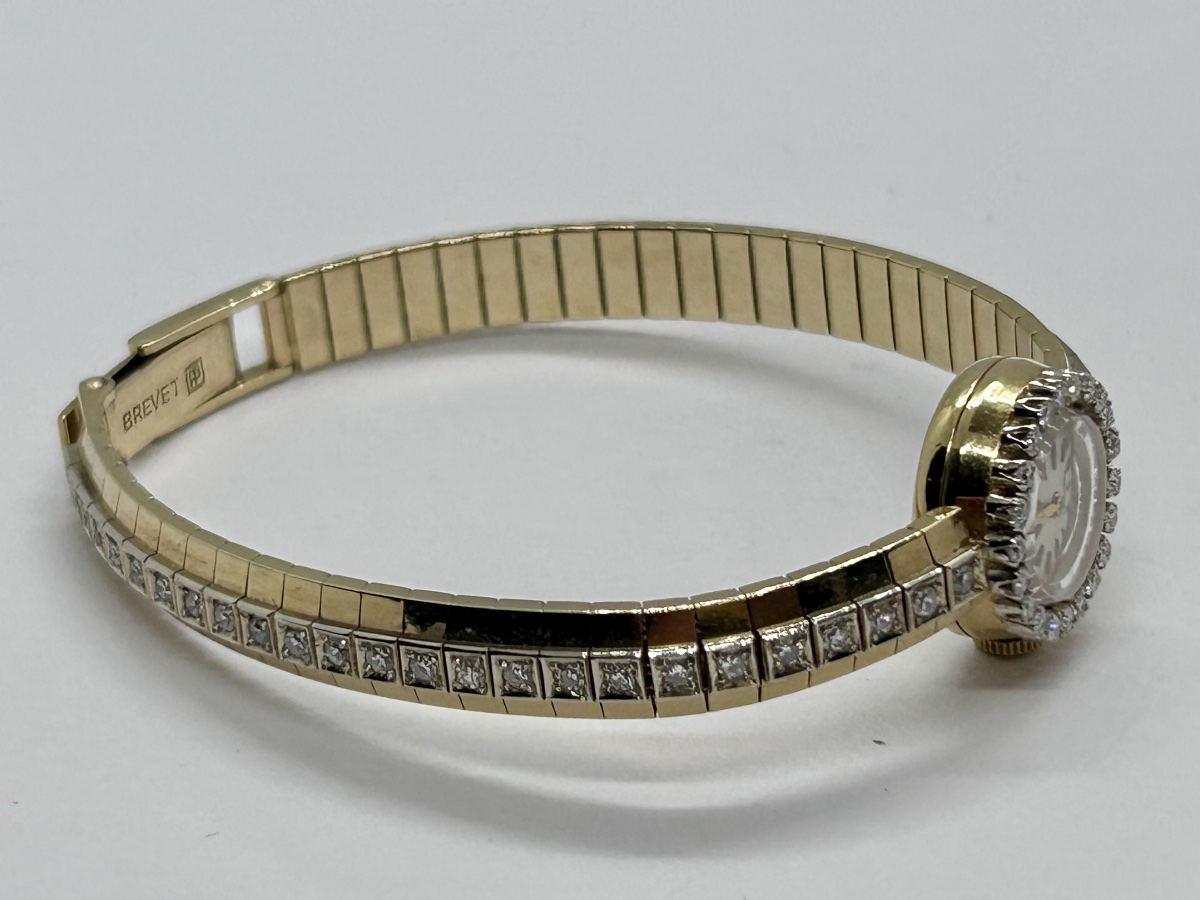 Longines, montre femme art déco en or 18k et brillants -photo-1