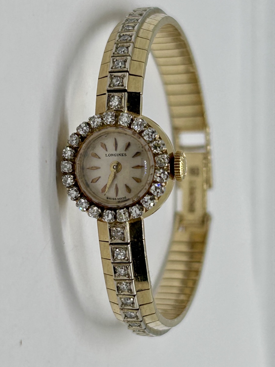Longines, montre femme art déco en or 18k et brillants 