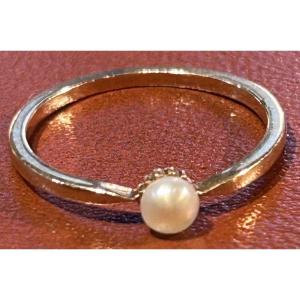 Bague d’enfant en or 18 carats et perle fine 