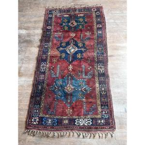 Ancien tapis de collection en laine XXe siècle