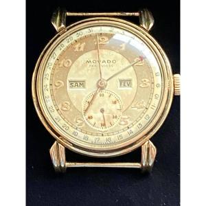 Montre art déco Movado triple calendrier en or 18 carats
