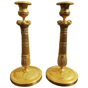 Paire de Flambeaux en bronzes dorés et ciselés Restauration XIX éme siécle