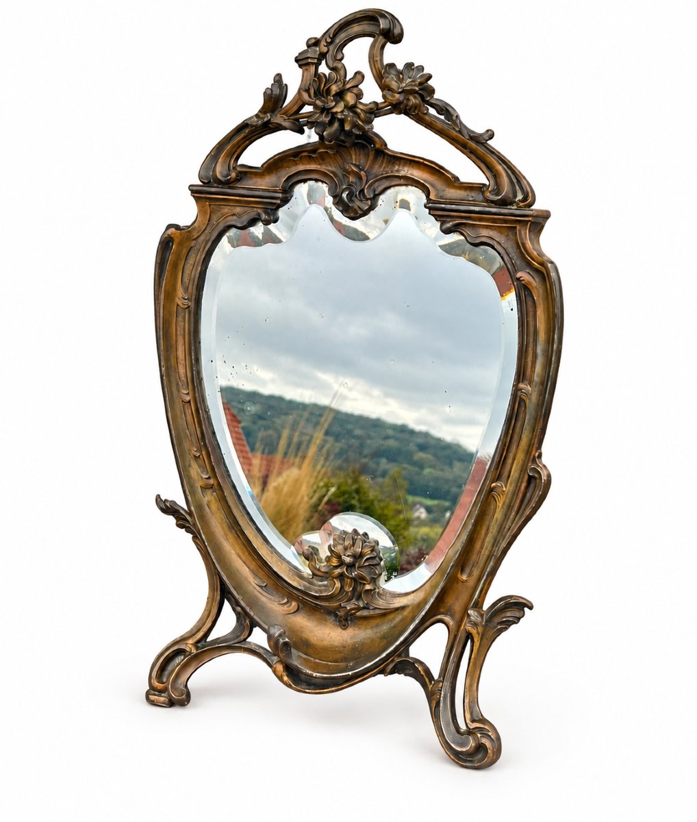 Miroir de table en métal patiné à décor de rocaille - vers 1900