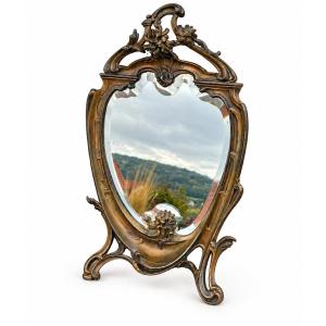 Miroir de table en métal patiné à décor de rocaille - vers 1900