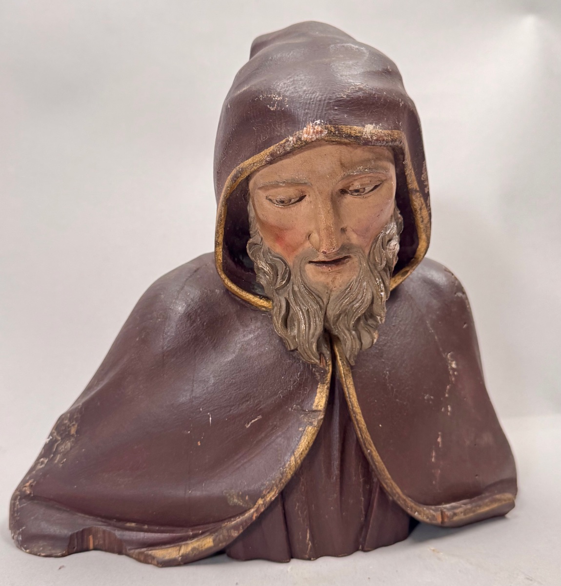 Wood Carving Of A Bust Of A Monk In Robes-photo-1