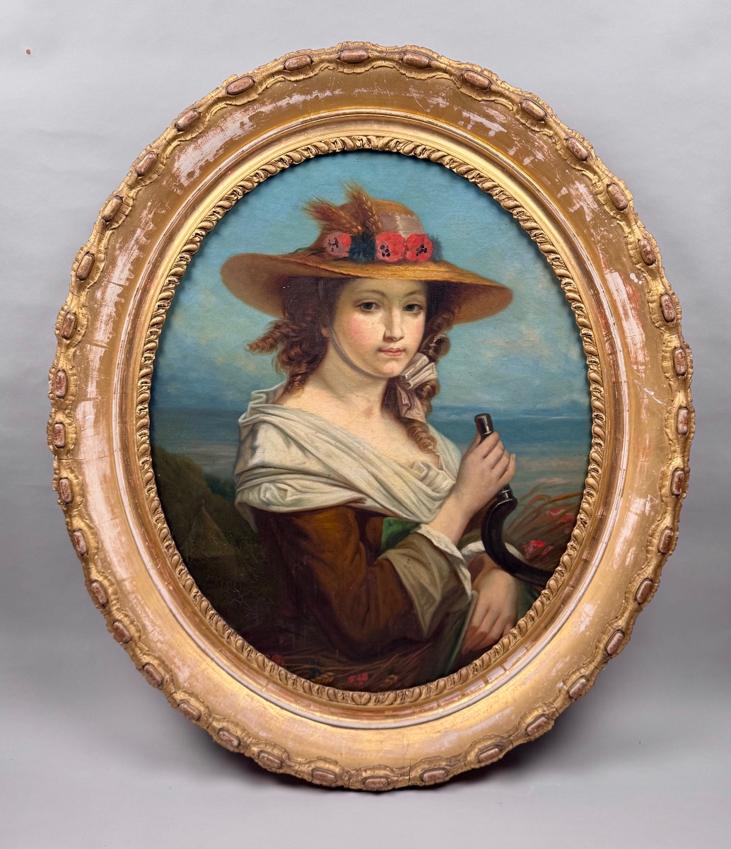Grand portrait ovale d’une jeune femme représentée en paysanne , école italienne , XIXème .