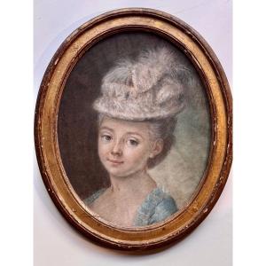 Portrait Of A Young Woman In An 18th-century Hat