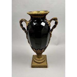Grand vase en ceramique noire et anses en bronze doré