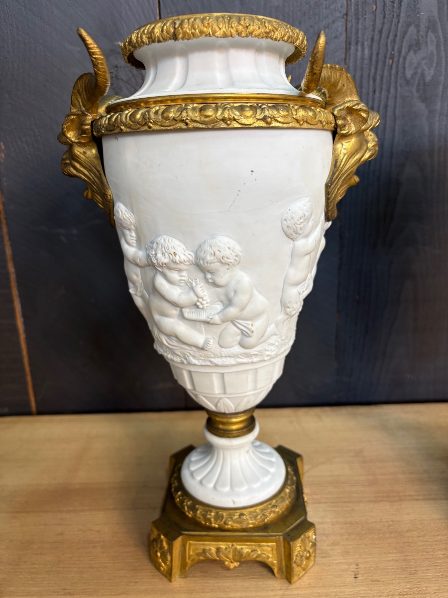 Pair Of Bisque And Gilded Bronze Amphorae Decorated With Cherubs And Ram's Heads -photo-7