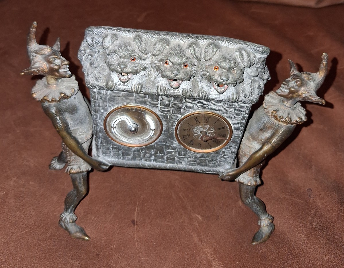 Pendule pendulette automate  3 chiens tirant la langue