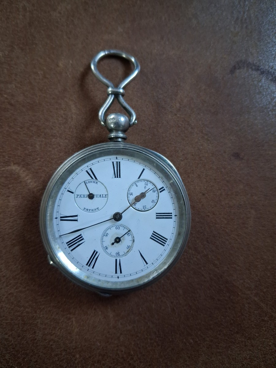 Montre remontage automatique  Loehr patent en argent 