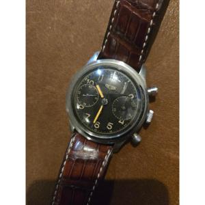 Montre chronographe Heuer vers 1940 cadran noir