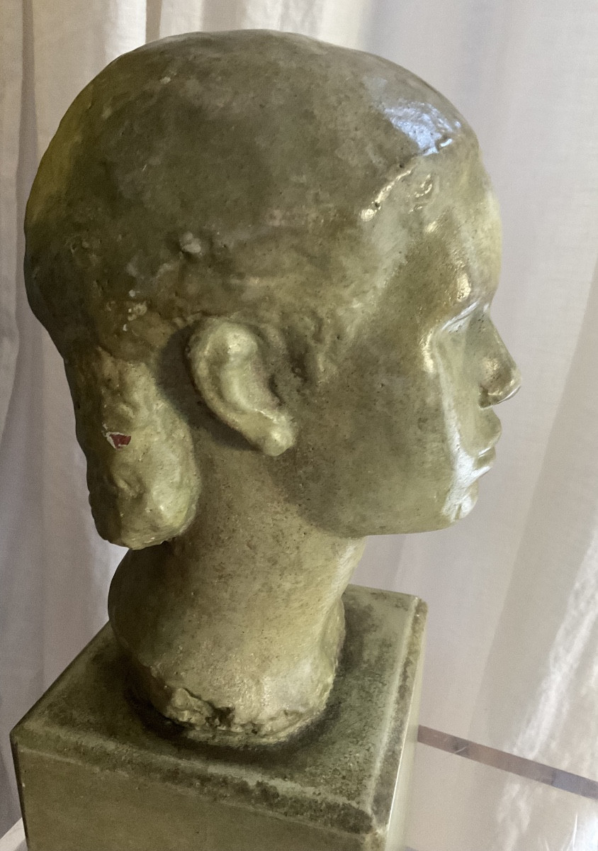 Head Of A Woman In Soft Green Glazed Terracotta