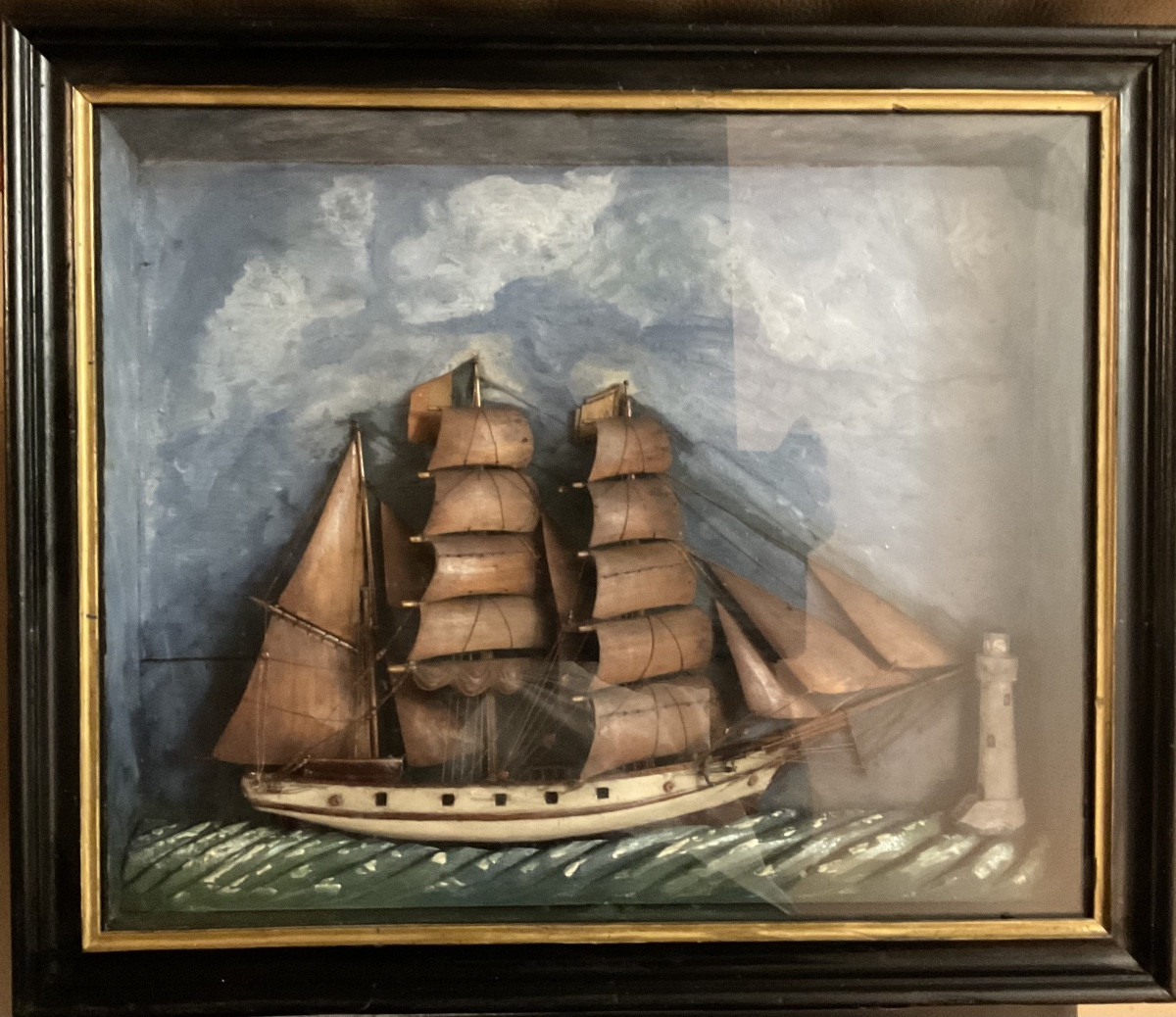 Diorama Of A Wooden Sailboat With A Lighthouse -photo-2