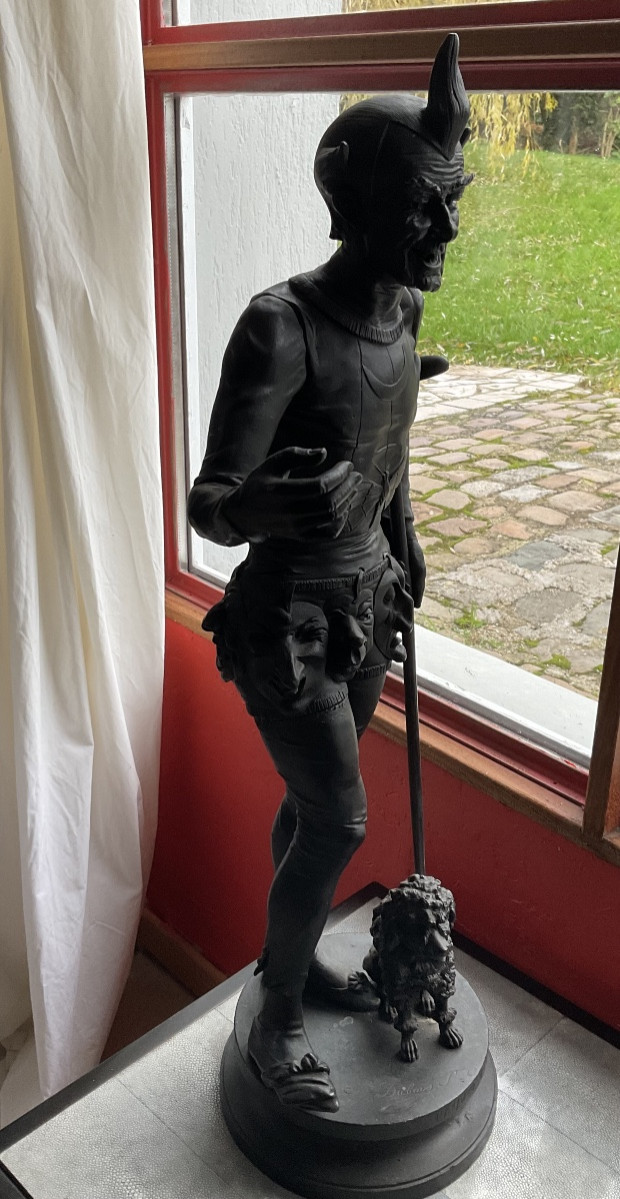 Bronze le marchand de masques H75cm