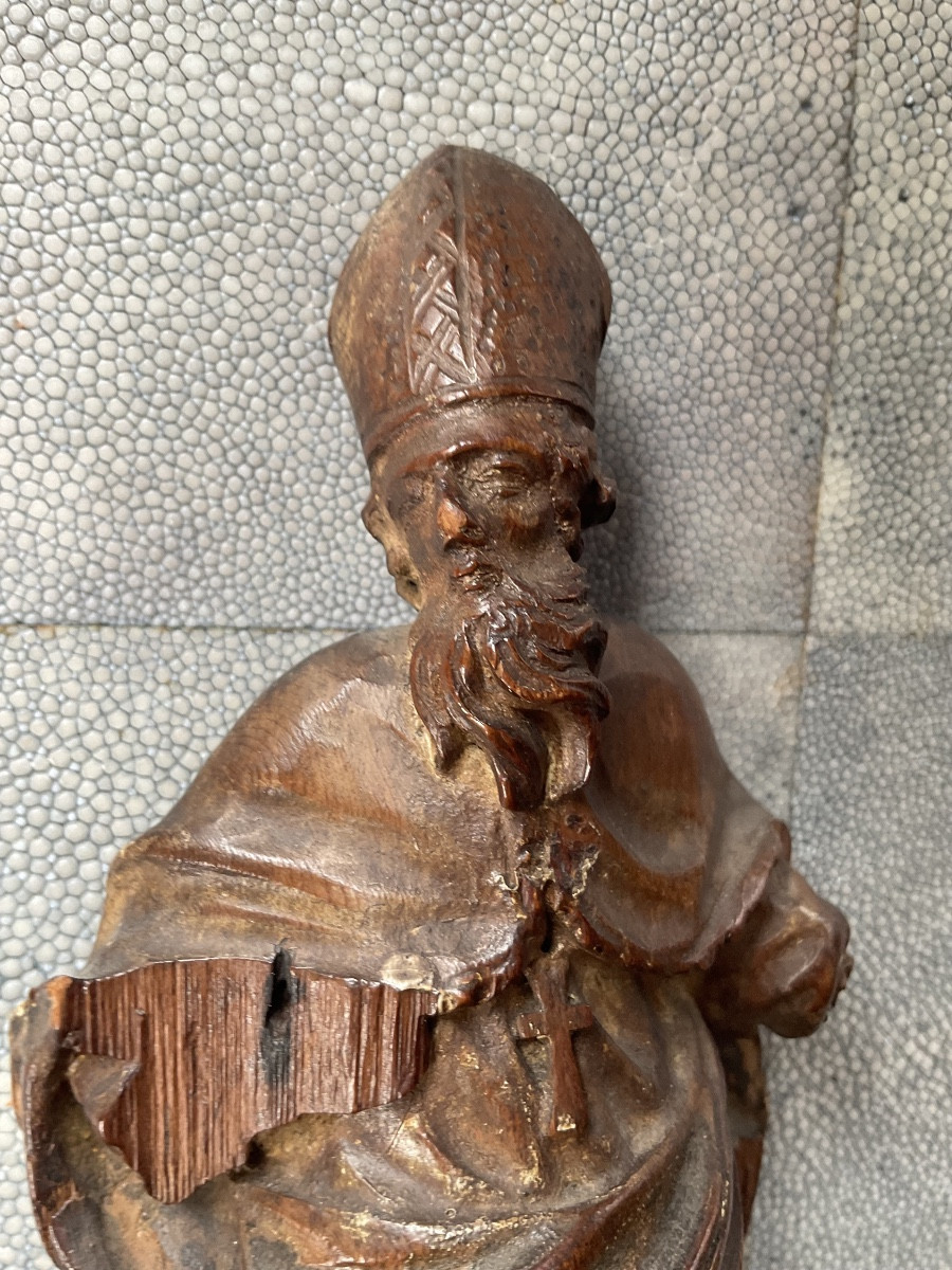 Small Statue Of Saint On A Pedestal 