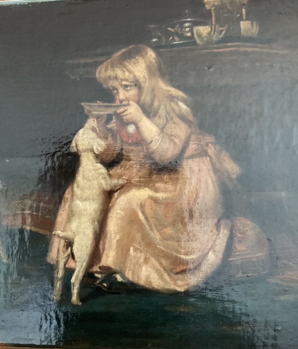 Petite fille entourée de son chat et de son chien