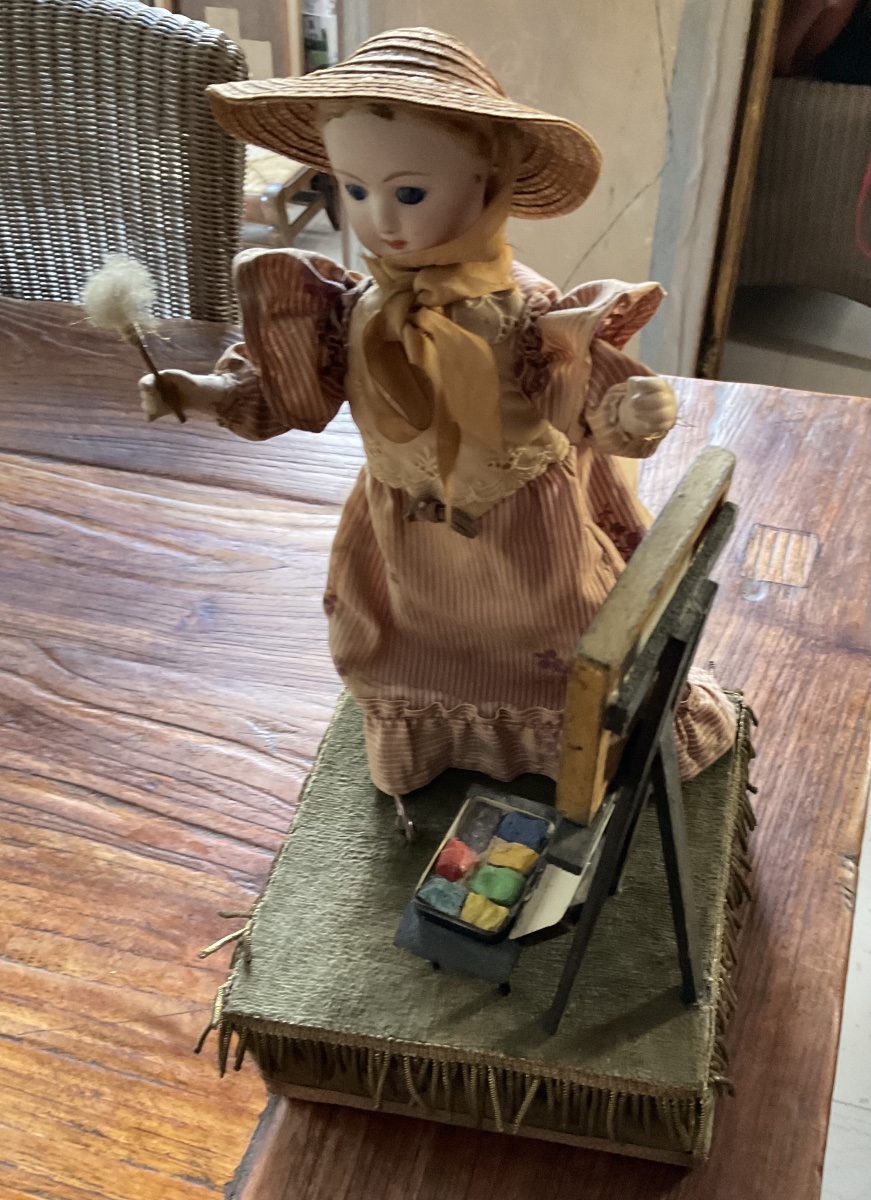 Automate poupée à son chevalet