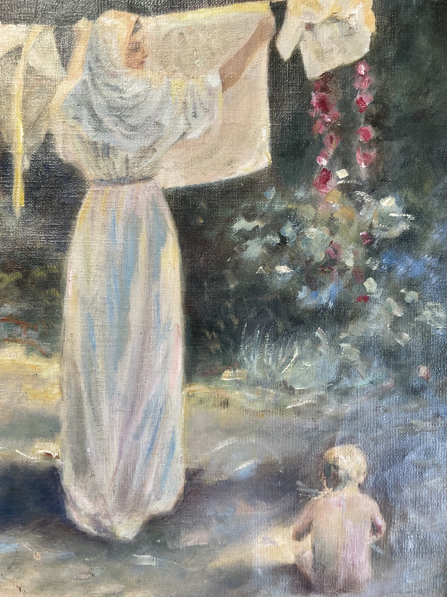 Femme étendant son linge avec son bébé  hs t-photo-4