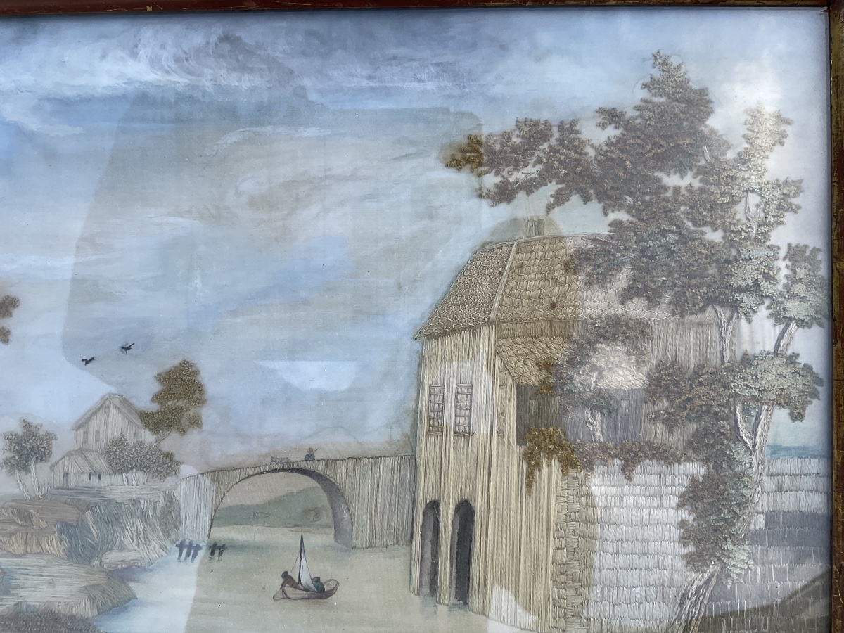 Travail de broderie représentant des personnages au bord de l’eau-photo-2