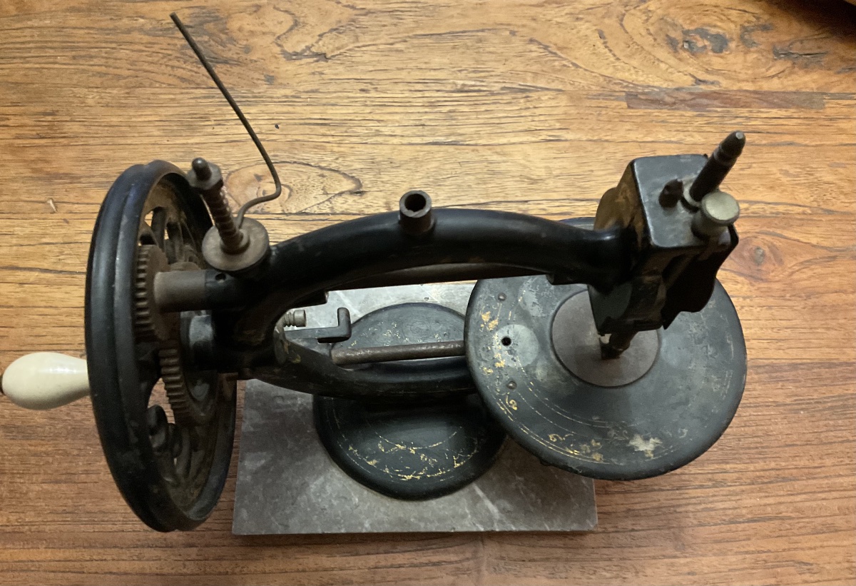 Hand-operated Sewing Machine Made Of Enameled Cast Iron Mounted On A Marble Base-photo-3