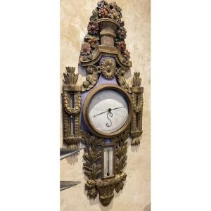 Grand modèle de baromètre XVIIIe bois doré et polychrome 